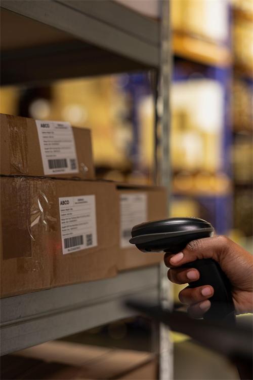 Close-up of parcel barcode scanning for Marlboro Gold wholesale tracking